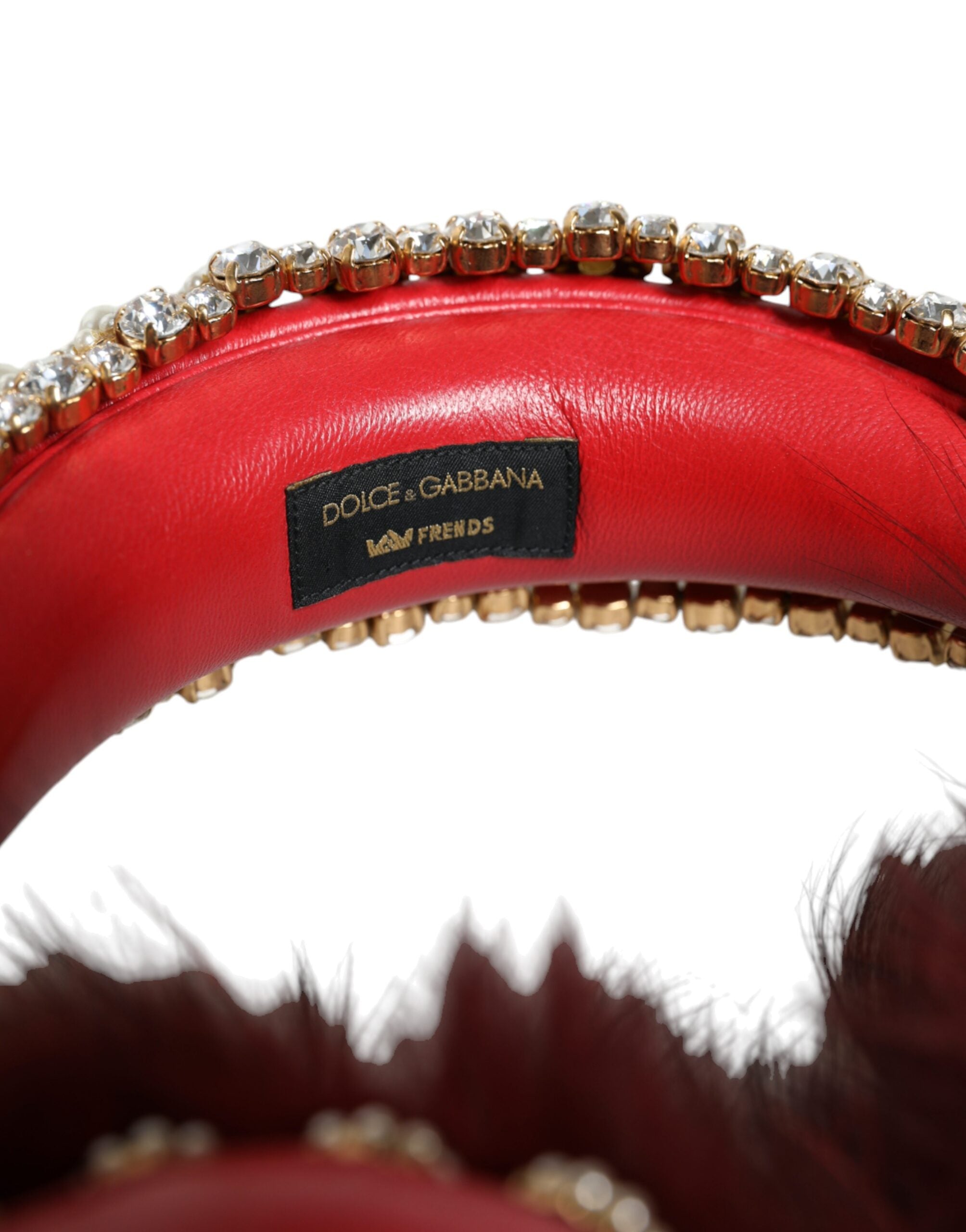 Red gold crystal fur Dolce & Gabbana headset with audio AUX headphones, featuring luxurious design and plush fur detailing.