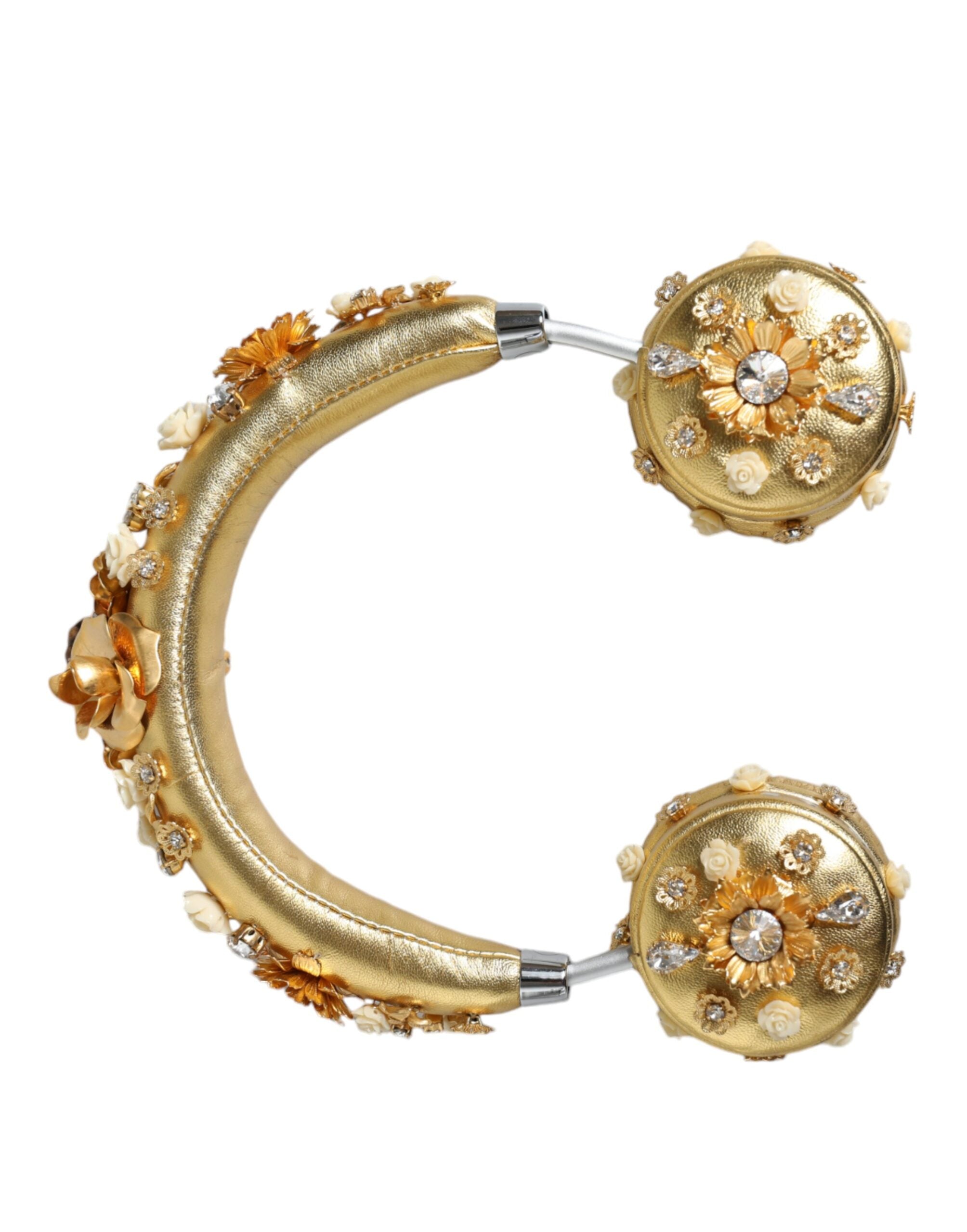 Gold leather floral crystal angel-shaped headset headphones by Dolce & Gabbana with intricate floral embellishments and crystal accents.