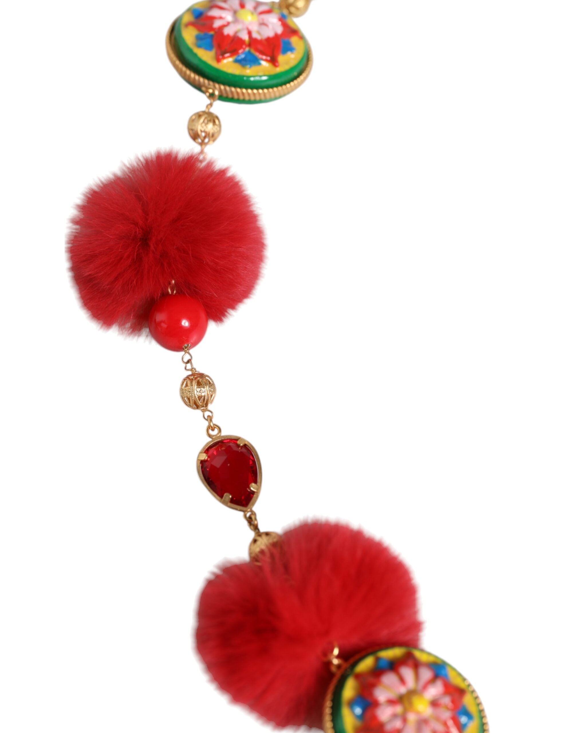 Gold brass waist belt with red fur and crystal accents from Dolce & Gabbana, featuring a torero design.