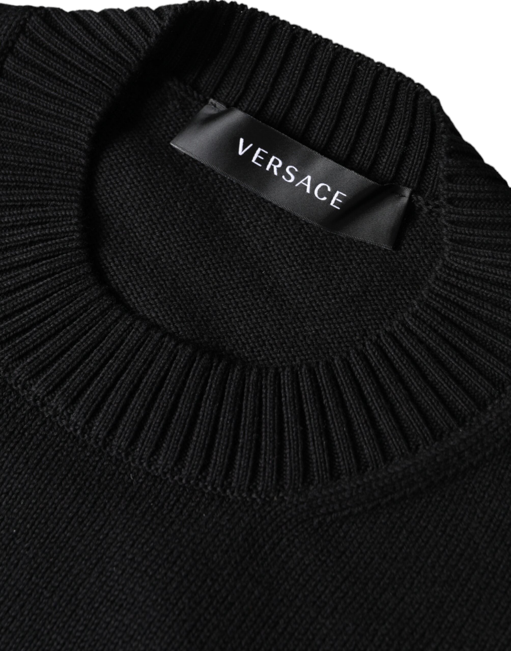 Versace black Medusa embroidery crew neck pullover sweater with detailed Medusa design on the front.