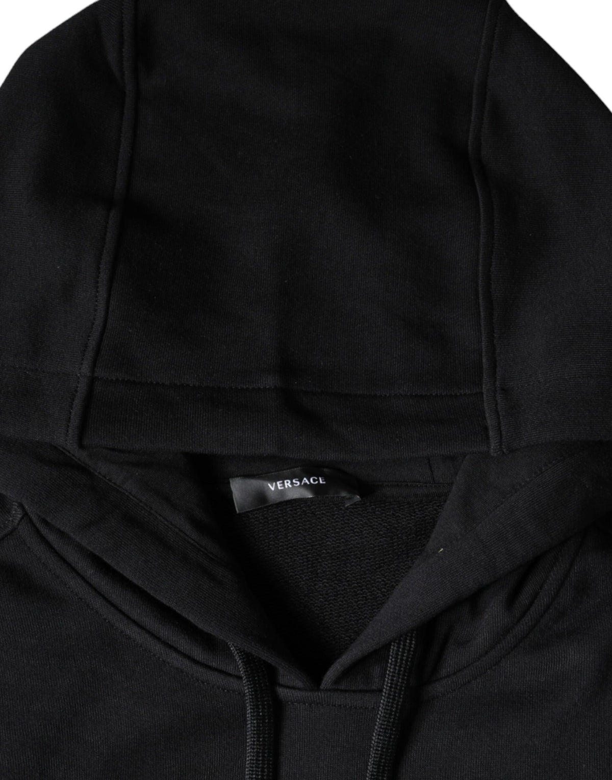 Black cotton hoodie with Medusa print from Versace featuring a pullover sweatshirt design and bold graphic artwork.