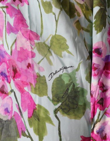 Multicolor floral silk stretch wrap dress by Dolce & Gabbana displayed on a model.