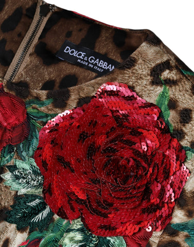 Brown leopard and red roses cotton A-line dress by Dolce & Gabbana, featuring a stylish floral and animal print design.