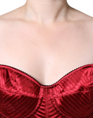 Red bustier corset lace bodycon midi dress by Dolce & Gabbana, featuring a fitted silhouette and intricate lace details.