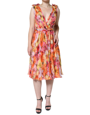Dolce & Gabbana multicolor floral sleeveless V-neck midi dress displayed on a hanger with vibrant floral patterns.