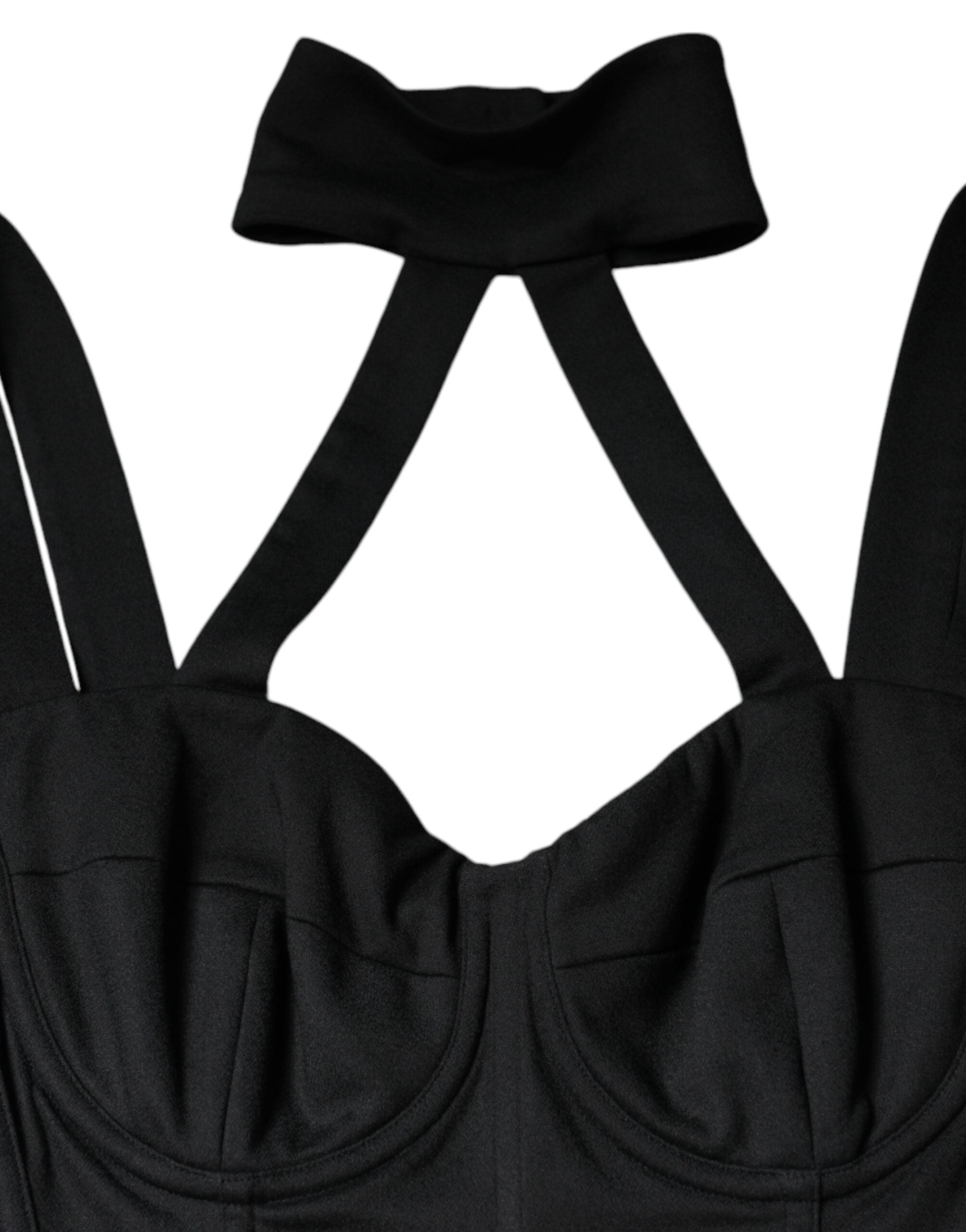 Black cut-out sleeveless bodycon mini dress by Dolce & Gabbana, shown on a model with a fitted silhouette and stylish design.
