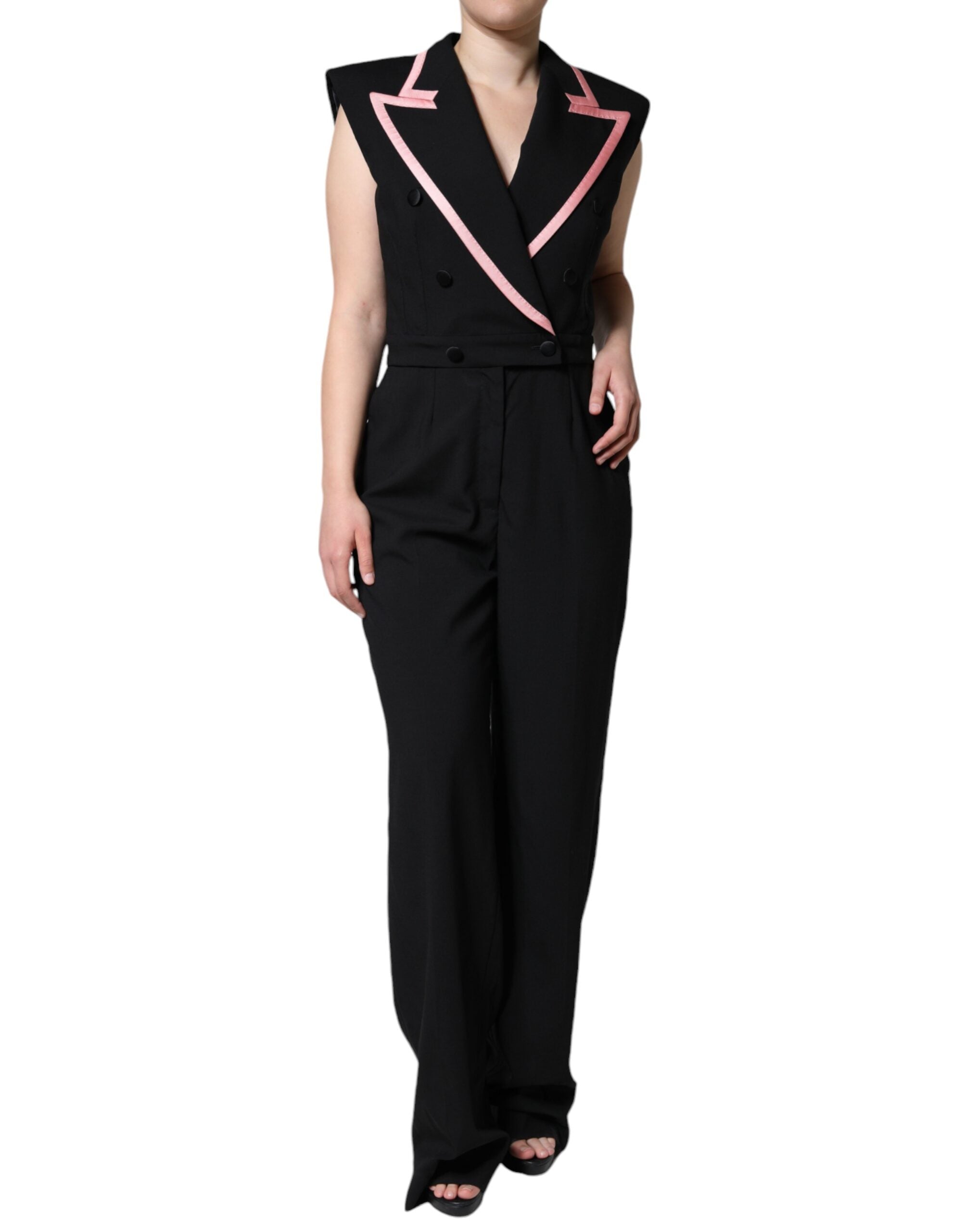 Black wool blend sleeveless jumpsuit dress by Dolce & Gabbana displayed on a hanger with a fitted silhouette.