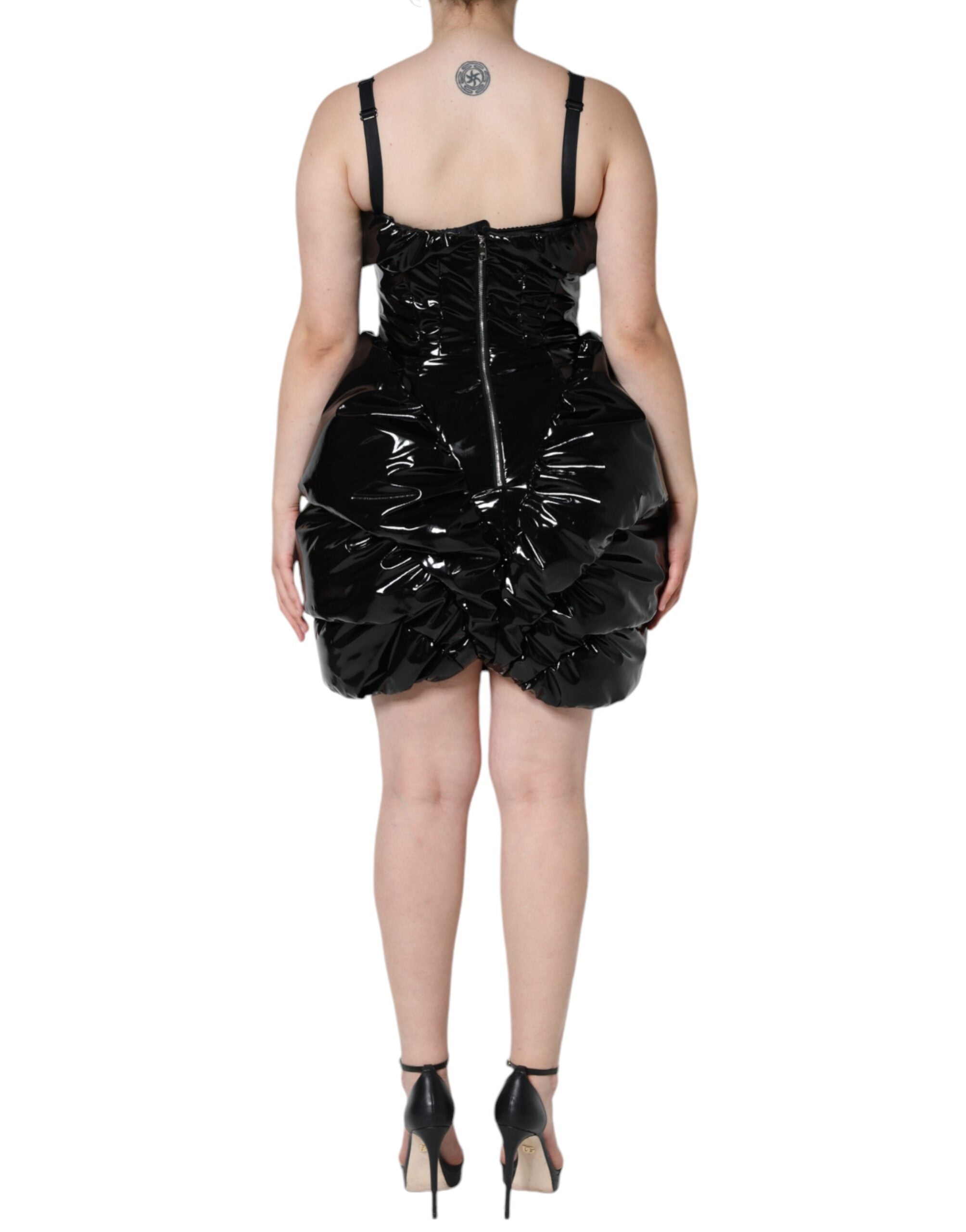 Black polyester ruched coated mini dress by Dolce & Gabbana, featuring a fitted silhouette and stylish ruched detailing.