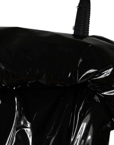 Black polyester ruched coated mini dress by Dolce & Gabbana, featuring a fitted silhouette and stylish detailing.