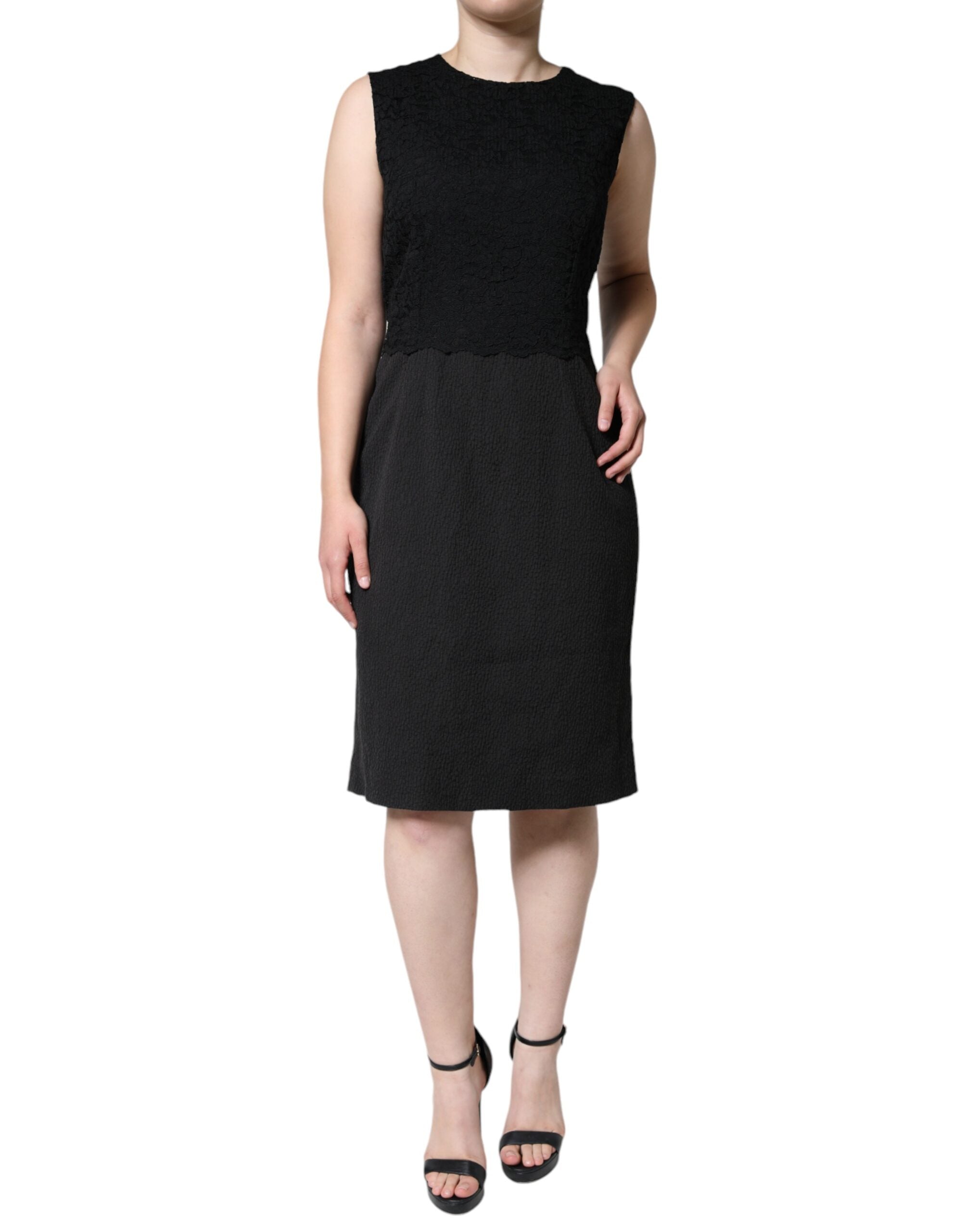Black cotton sheath knee-length dress by Dolce & Gabbana, fitted silhouette with sleeveless design and classic round neckline.