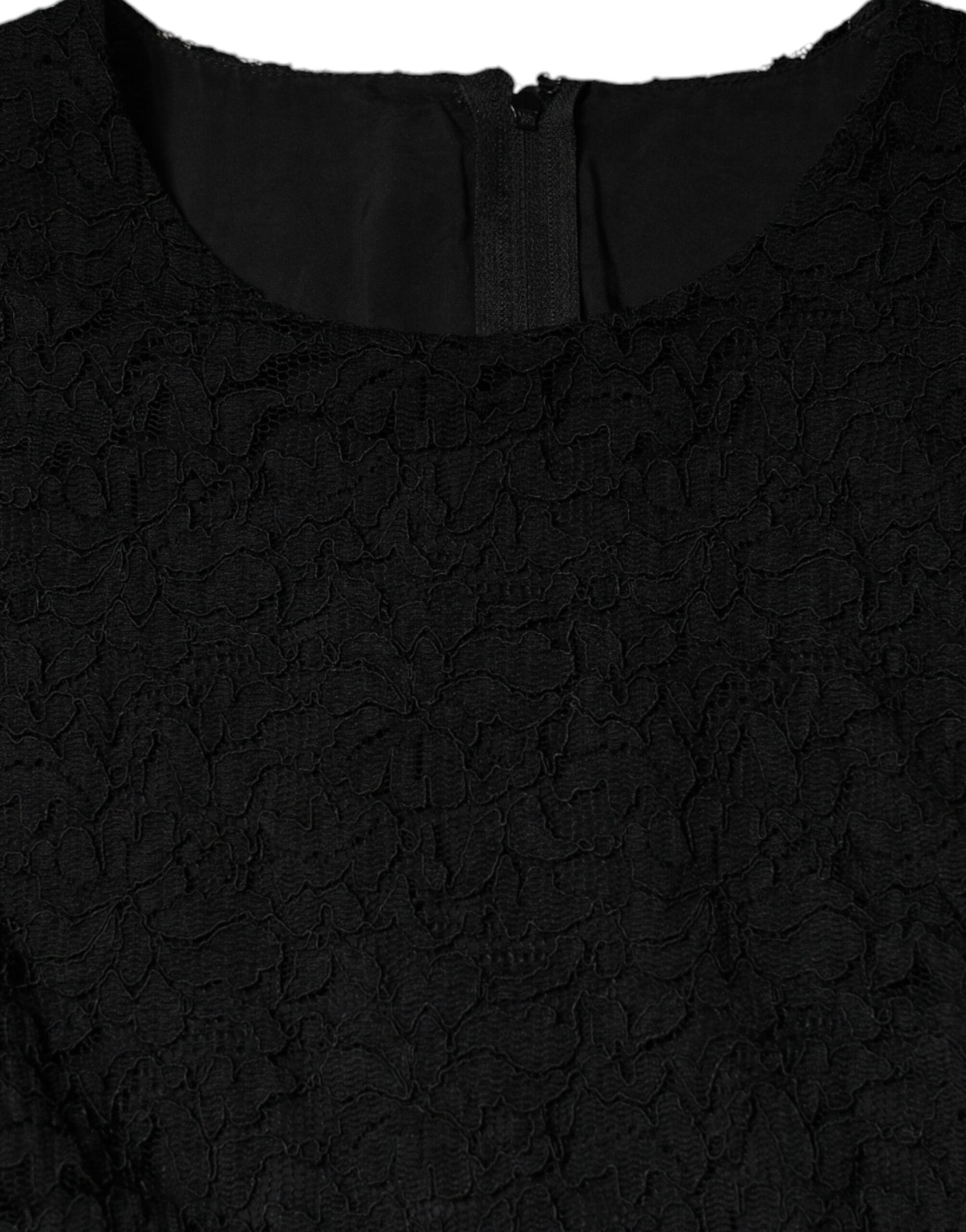 Black cotton sheath knee-length dress by Dolce & Gabbana, fitted silhouette, sleeveless design, and classic round neckline.