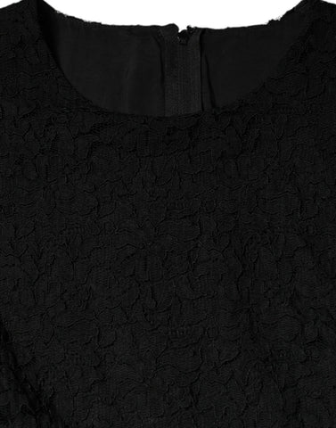 Black cotton sheath knee-length dress by Dolce & Gabbana, fitted silhouette, sleeveless design, and classic round neckline.