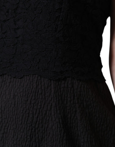 Black cotton sheath knee-length dress by Dolce & Gabbana, featuring a fitted silhouette and elegant design.