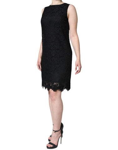 Black floral lace sheath sleeveless mini dress by Dolce & Gabbana with intricate lace pattern and fitted silhouette.