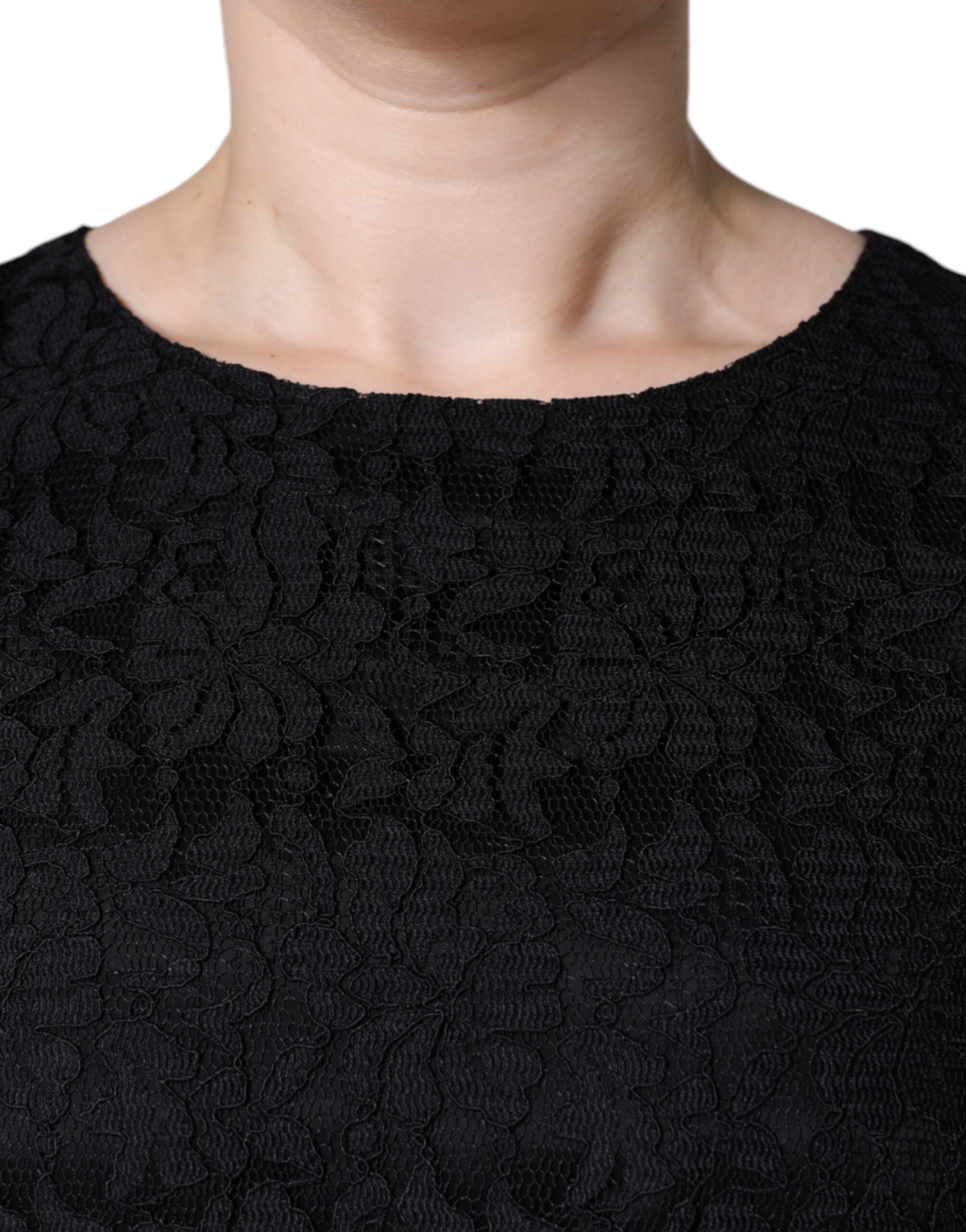 Black floral lace sheath sleeveless mini dress by Dolce & Gabbana, featuring intricate lace details and a fitted silhouette.