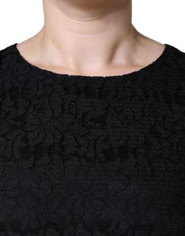 Black floral lace sheath sleeveless mini dress by Dolce & Gabbana, featuring intricate lace details and a fitted silhouette.