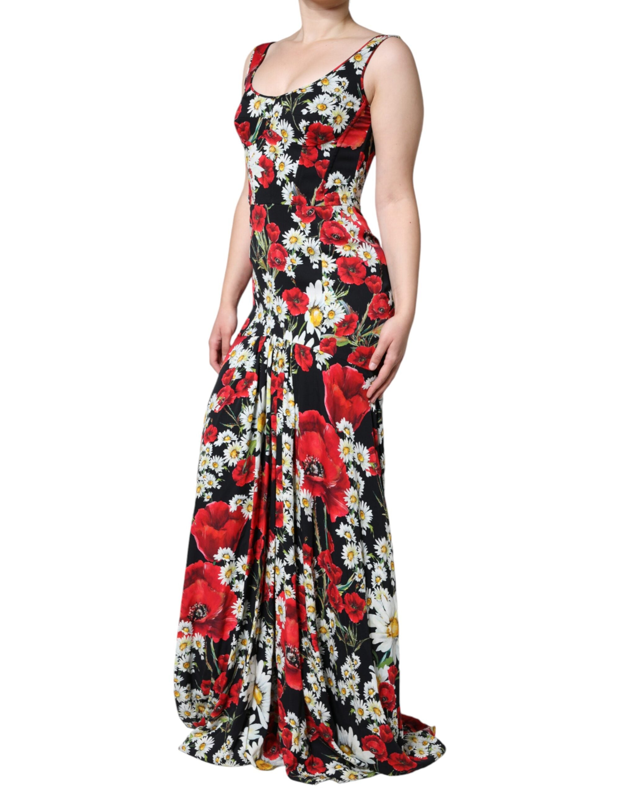 Black floral silk sleeveless long gown dress by Dolce & Gabbana displayed on a hanger against a neutral background.