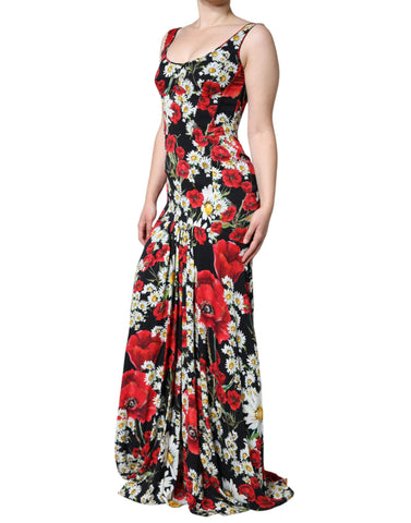 Black floral silk sleeveless long gown dress by Dolce & Gabbana displayed on a hanger against a neutral background.
