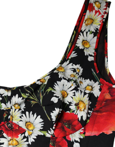 Black floral silk sleeveless long gown dress by Dolce & Gabbana, featuring elegant floral patterns and a flowing silhouette.