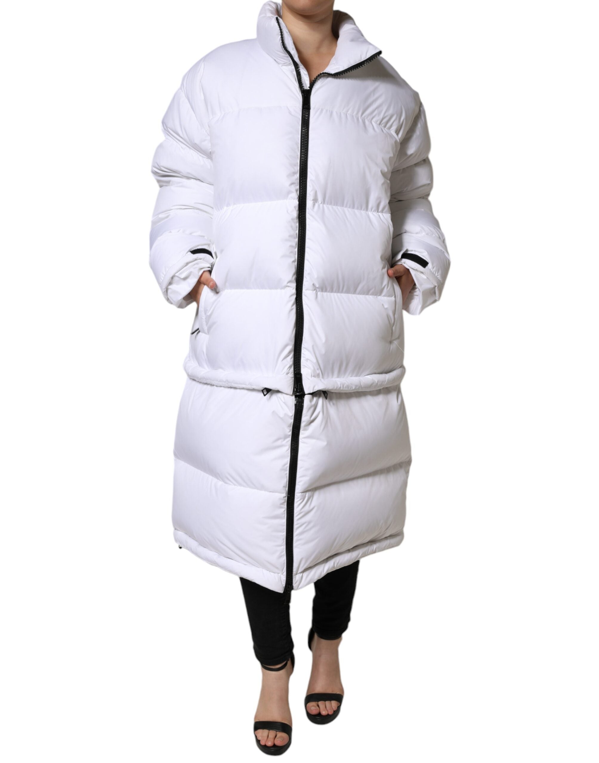 White puffer quilted full zip coat jacket by Dolce & Gabbana, shown on a hanger with a padded, insulated design for winter warmth.