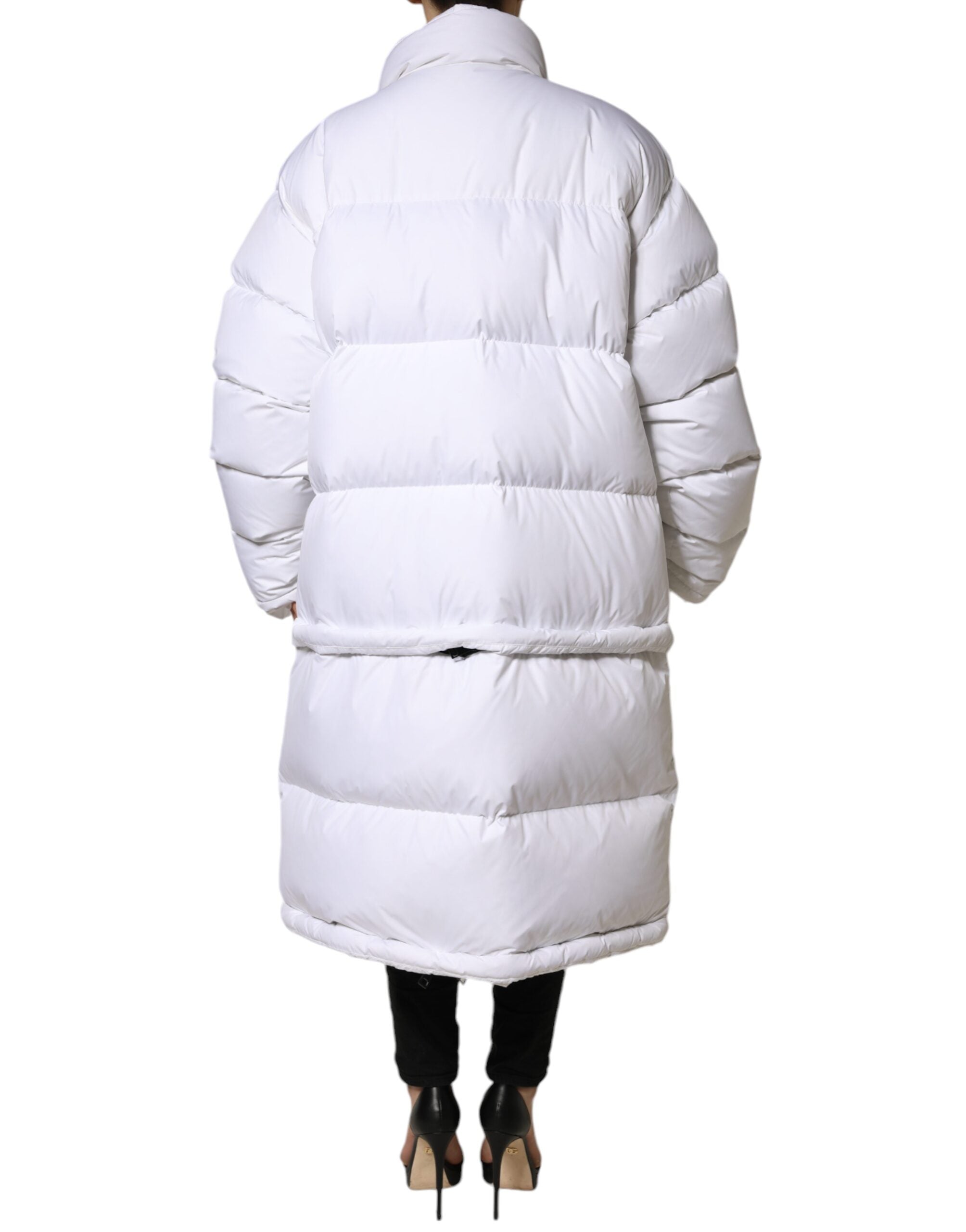 White puffer quilted full-zip coat jacket by Dolce & Gabbana, showing a sleek design with a front zipper and quilted texture.