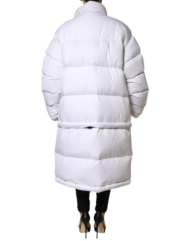 White puffer quilted full-zip coat jacket by Dolce & Gabbana, showing a sleek design with a front zipper and quilted texture.