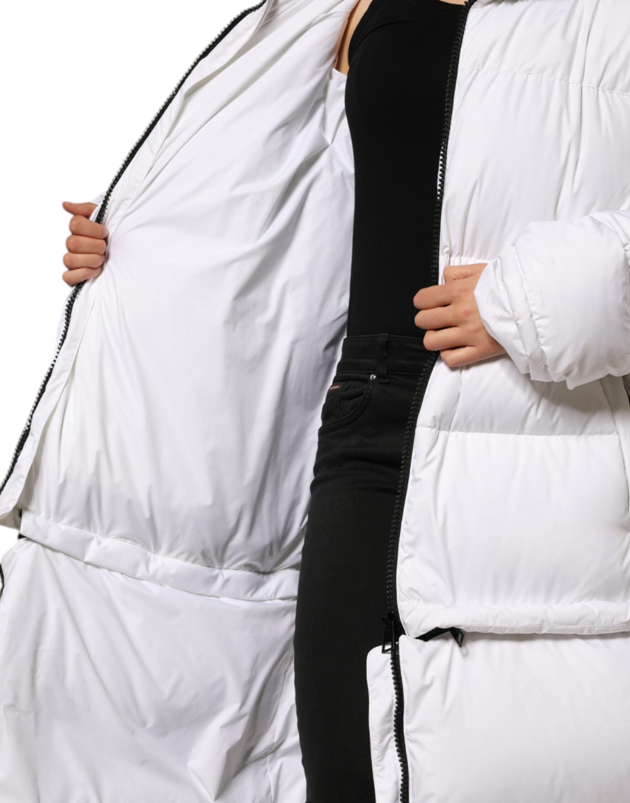 White puffer quilted full-zip coat jacket by Dolce & Gabbana, shown on a model with a high collar and padded design.