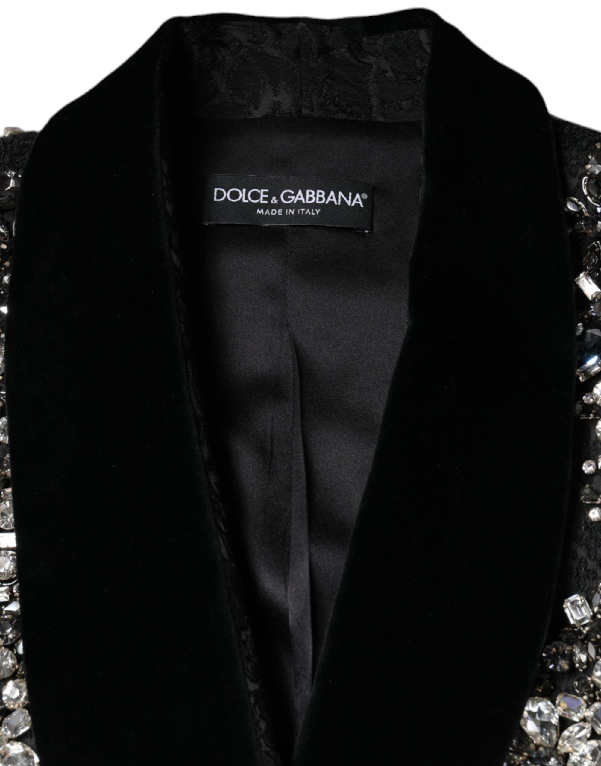 Black jacquard floral blazer jacket with crystal embellishments by Dolce & Gabbana, featuring intricate floral patterns and tailored fit.