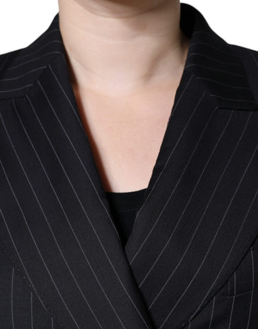 Black striped double-breasted coat jacket by Dolce & Gabbana, shown on a hanger with front view and classic lapel design.
