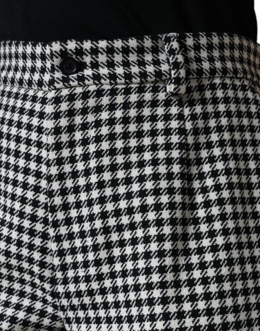 Black and white houndstooth cropped wide-leg pants by Dolce & Gabbana, shown with a relaxed fit and stylish design.