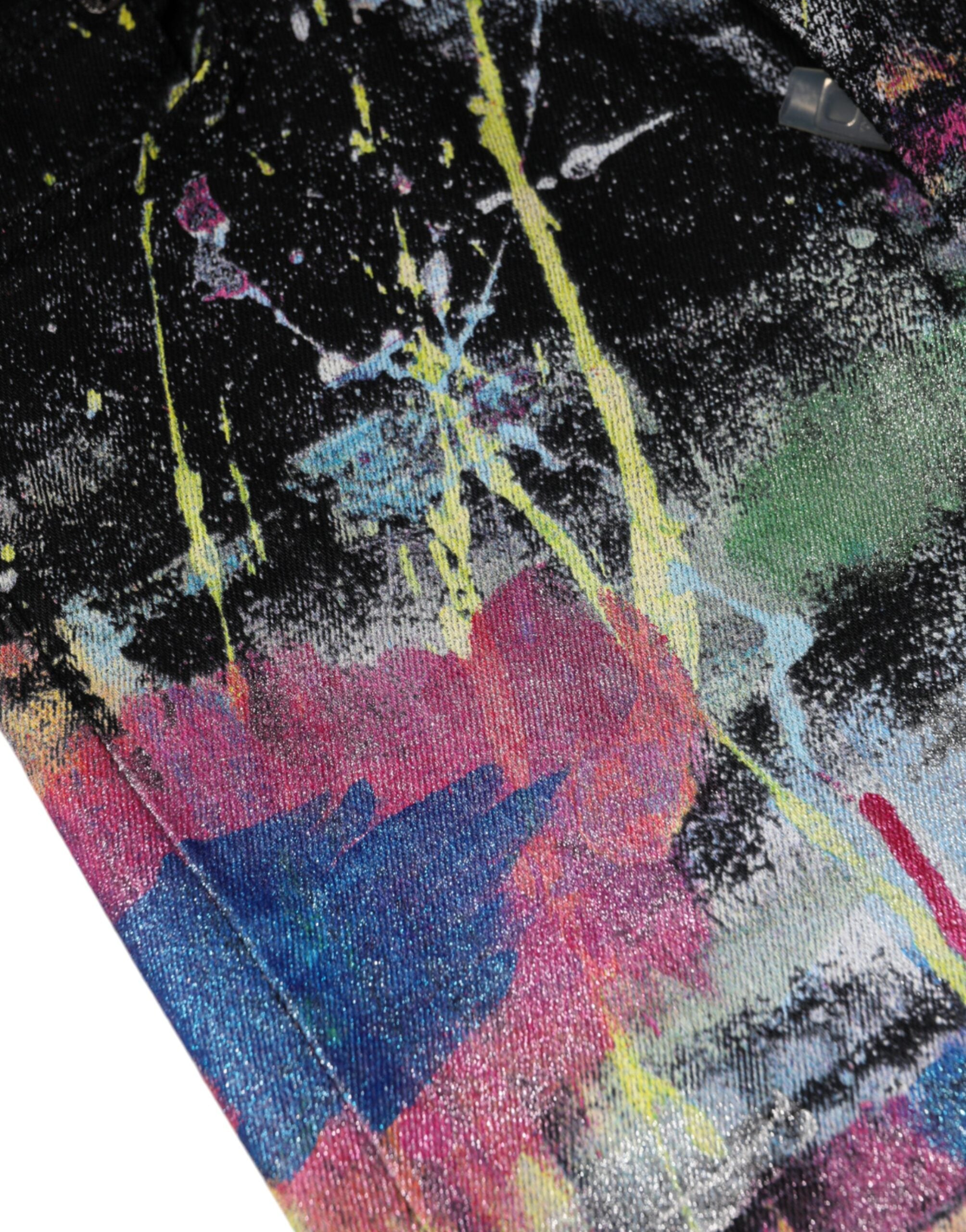 Dolce & Gabbana multicolor splatter paint cotton skinny denim jeans with distressed details and five-pocket design.