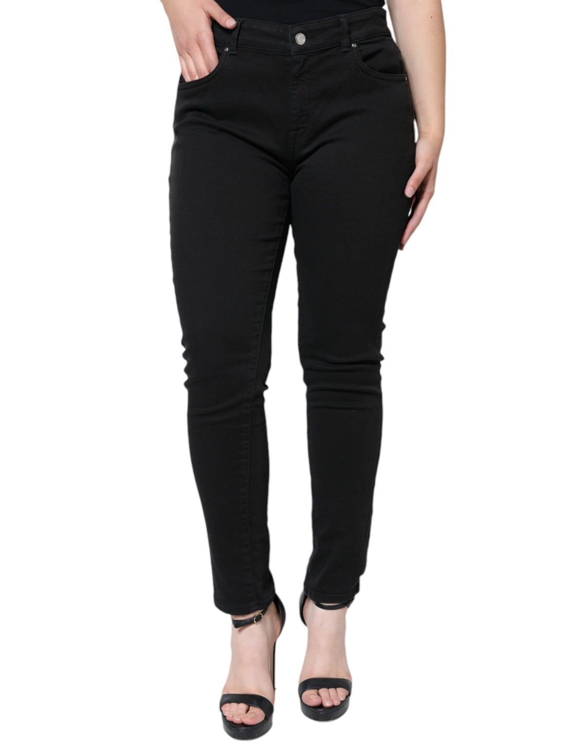 Black cotton stretch skinny denim jeans by Dolce & Gabbana, showing the fitted style and classic five-pocket design.