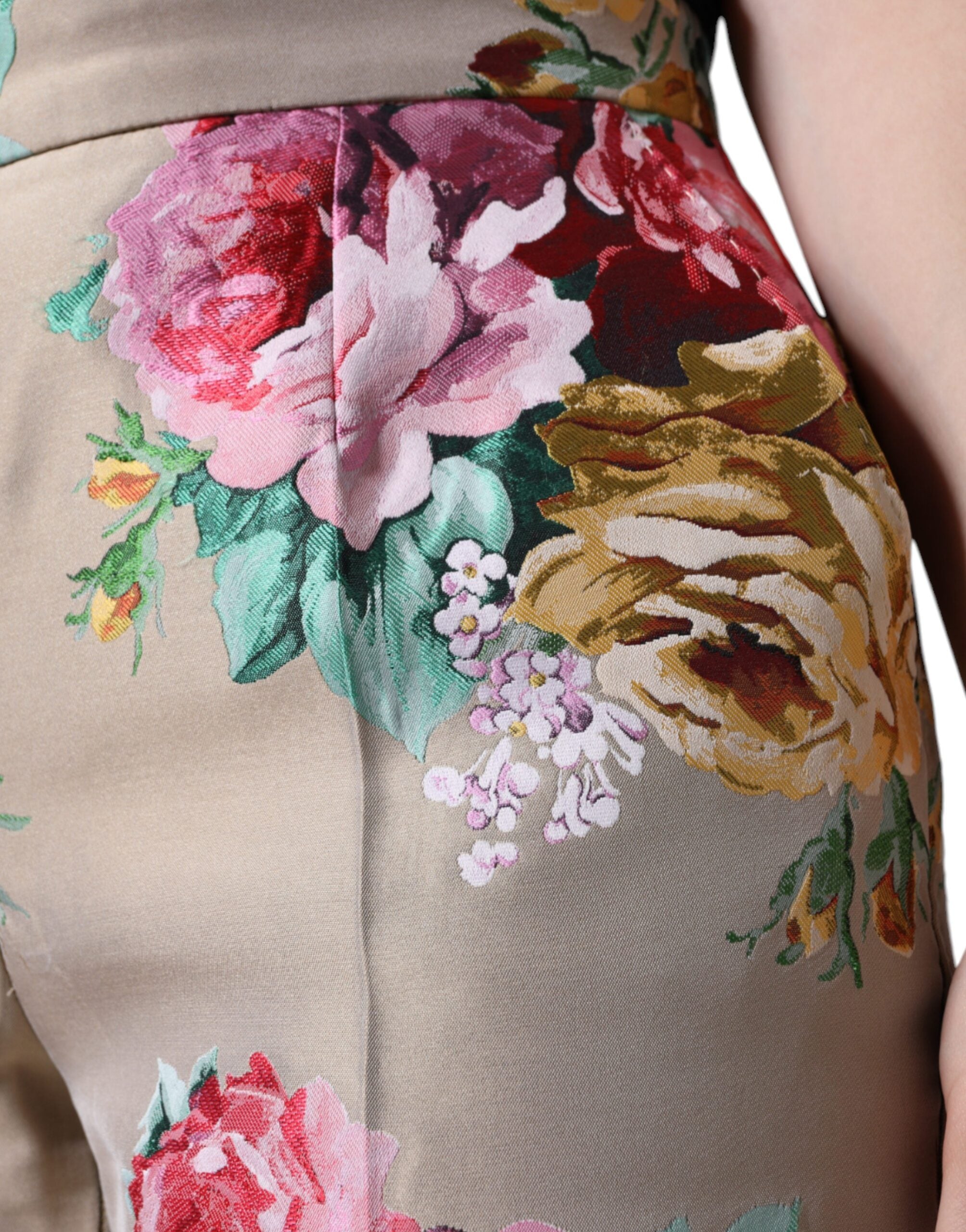 Beige floral jacquard high-waist tapered pants by Dolce & Gabbana, featuring elegant floral pattern and tailored fit.