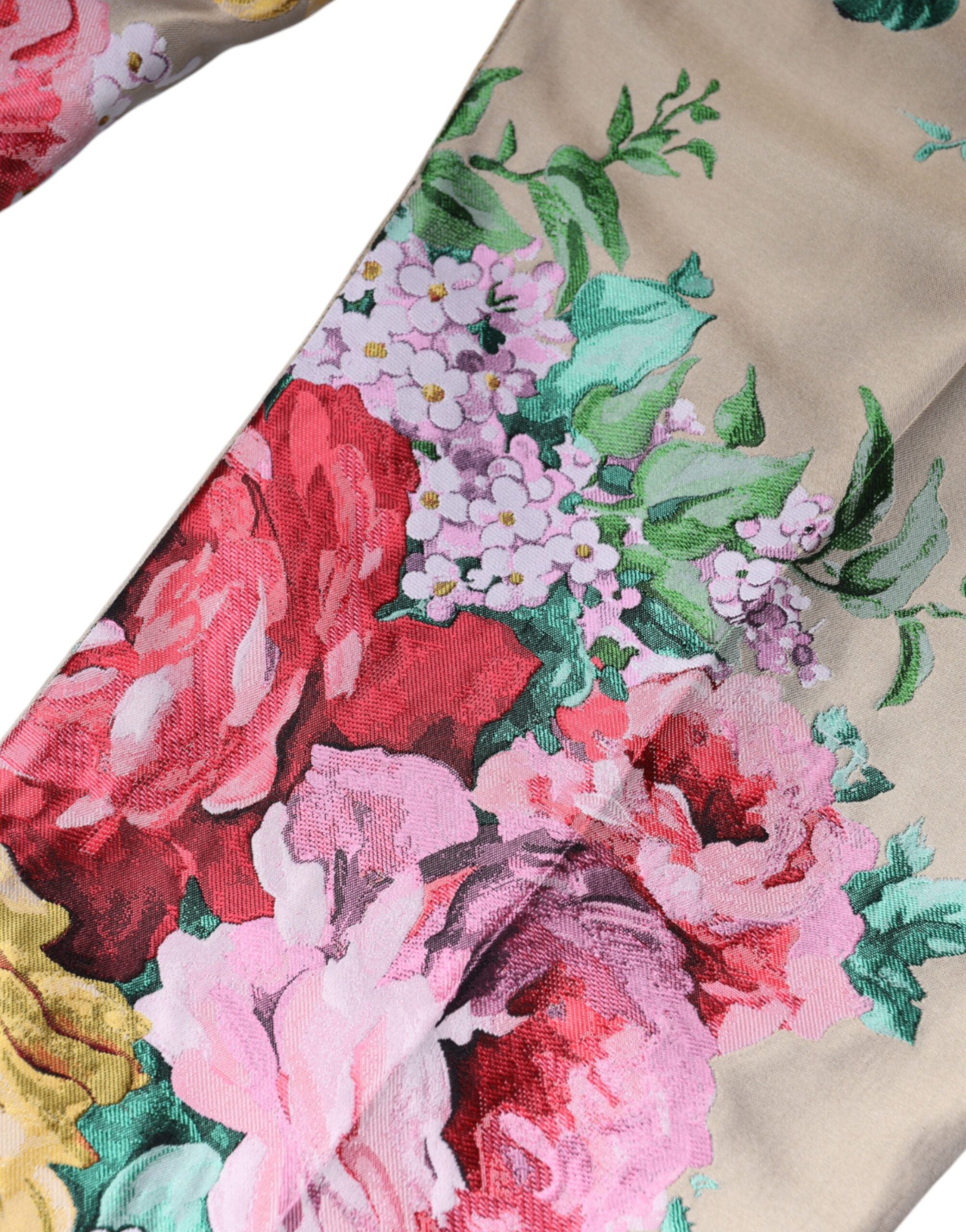 Beige floral jacquard high waist tapered pants by Dolce & Gabbana, showcasing elegant floral pattern and tailored fit.