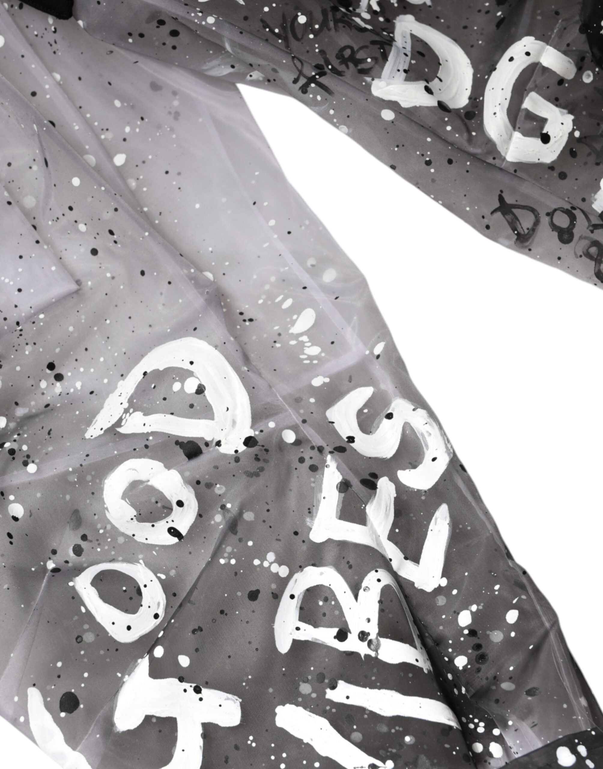 White see-through logo cropped cargo pants by Dolce & Gabbana, featuring sheer fabric and stylish cargo pockets.