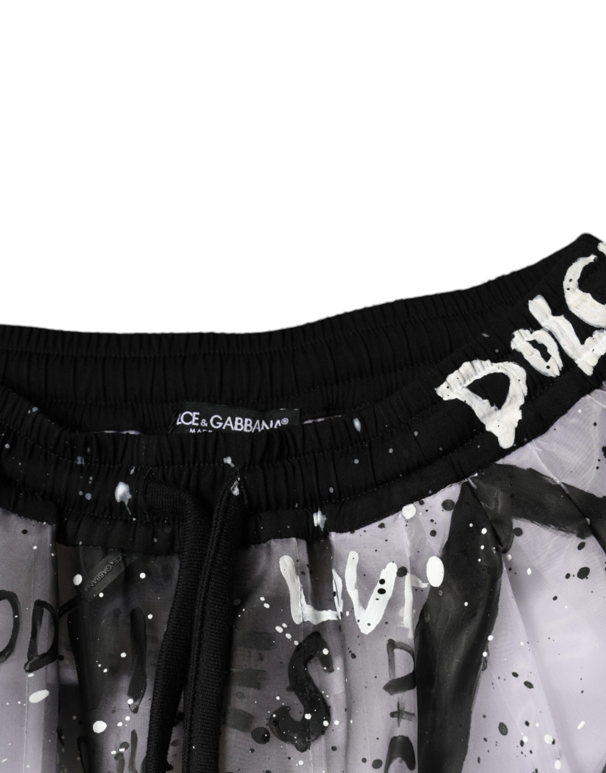 White see-through logo cropped cargo pants by Dolce & Gabbana with transparent fabric and cargo pockets.