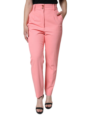 Rose pink polyester high waist tapered pants by Dolce & Gabbana, showing a close-up of the fabric and fit.