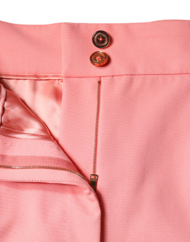 Rose pink polyester high waist tapered pants by Dolce & Gabbana, shown with a fitted waist and tapered leg silhouette.
