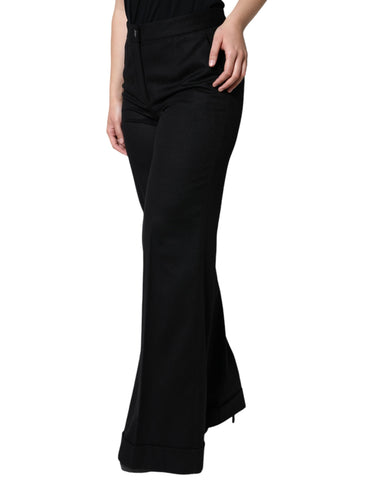 Black cashmere mid-waist women’s boot cut pants by Dolce & Gabbana, showcasing a sleek, tailored fit.