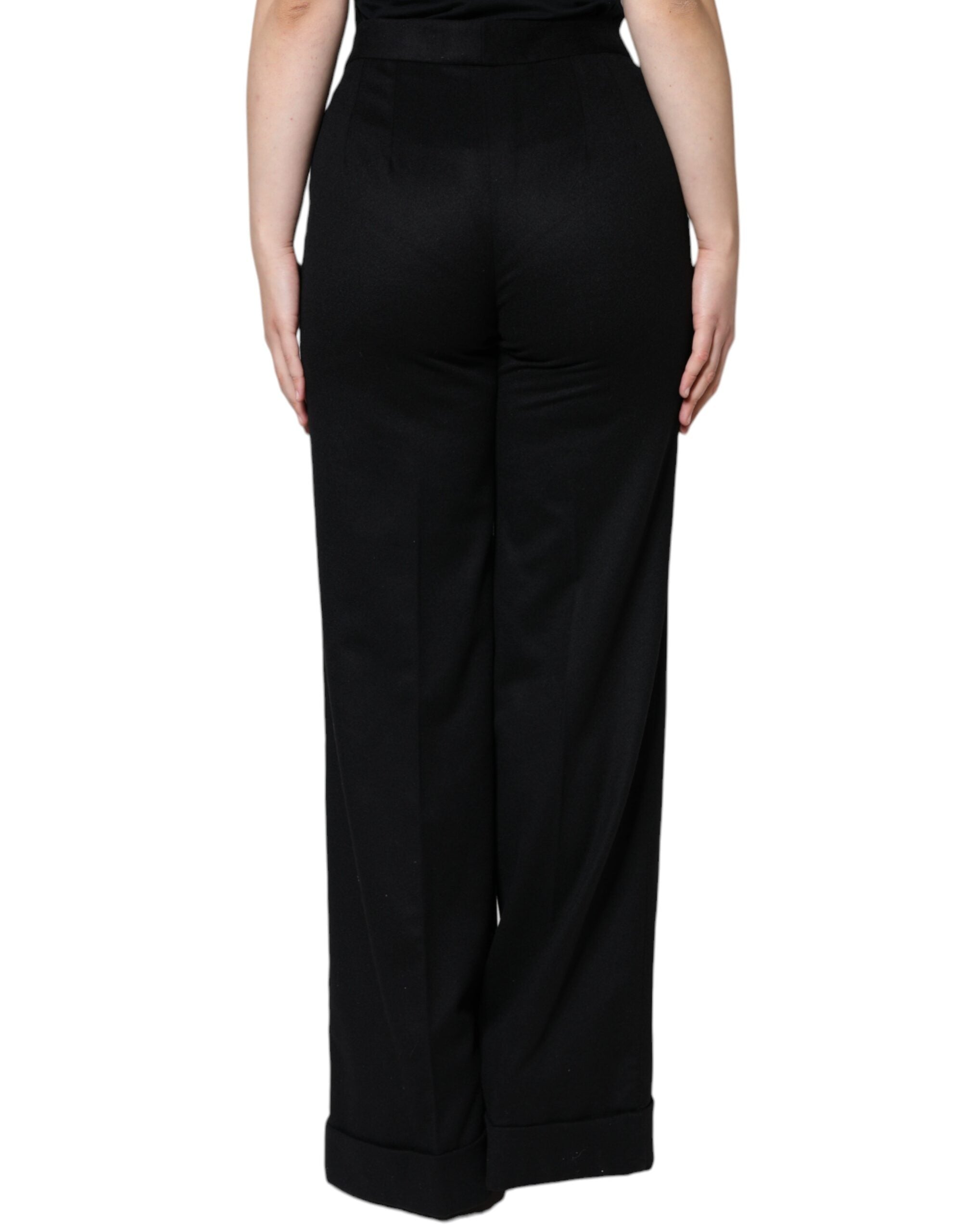 Black cashmere mid-waist boot cut pants for women by Dolce & Gabbana, shown on a model with a tailored fit and elegant style.