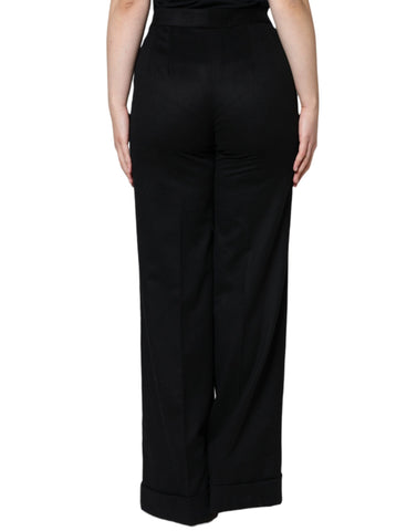 Black cashmere mid-waist boot cut pants for women by Dolce & Gabbana, shown on a model with a tailored fit and elegant style.