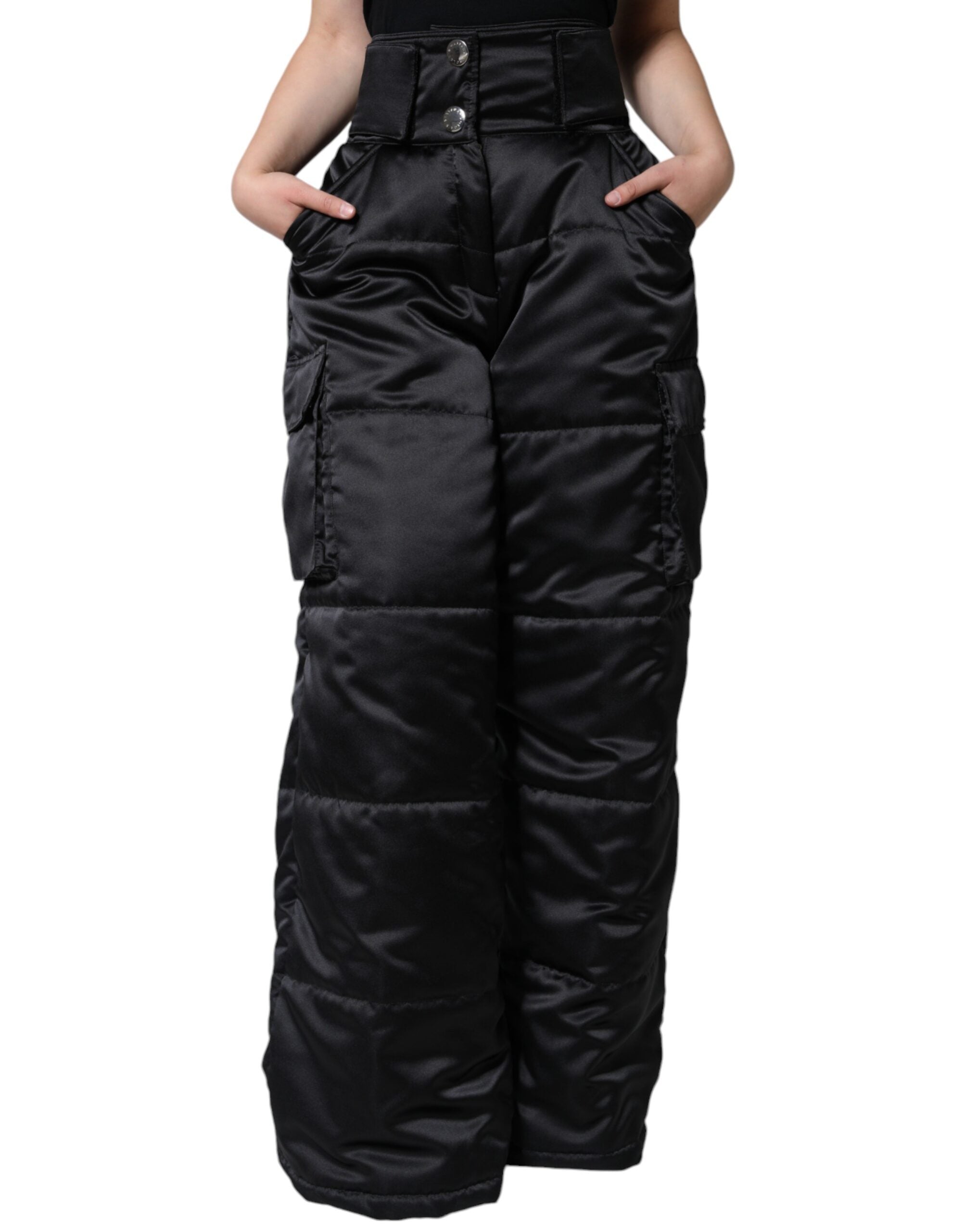 Black quilted high waist women’s boot cut pants by Dolce & Gabbana, shown with a close-up of the quilted fabric and high waist fit.