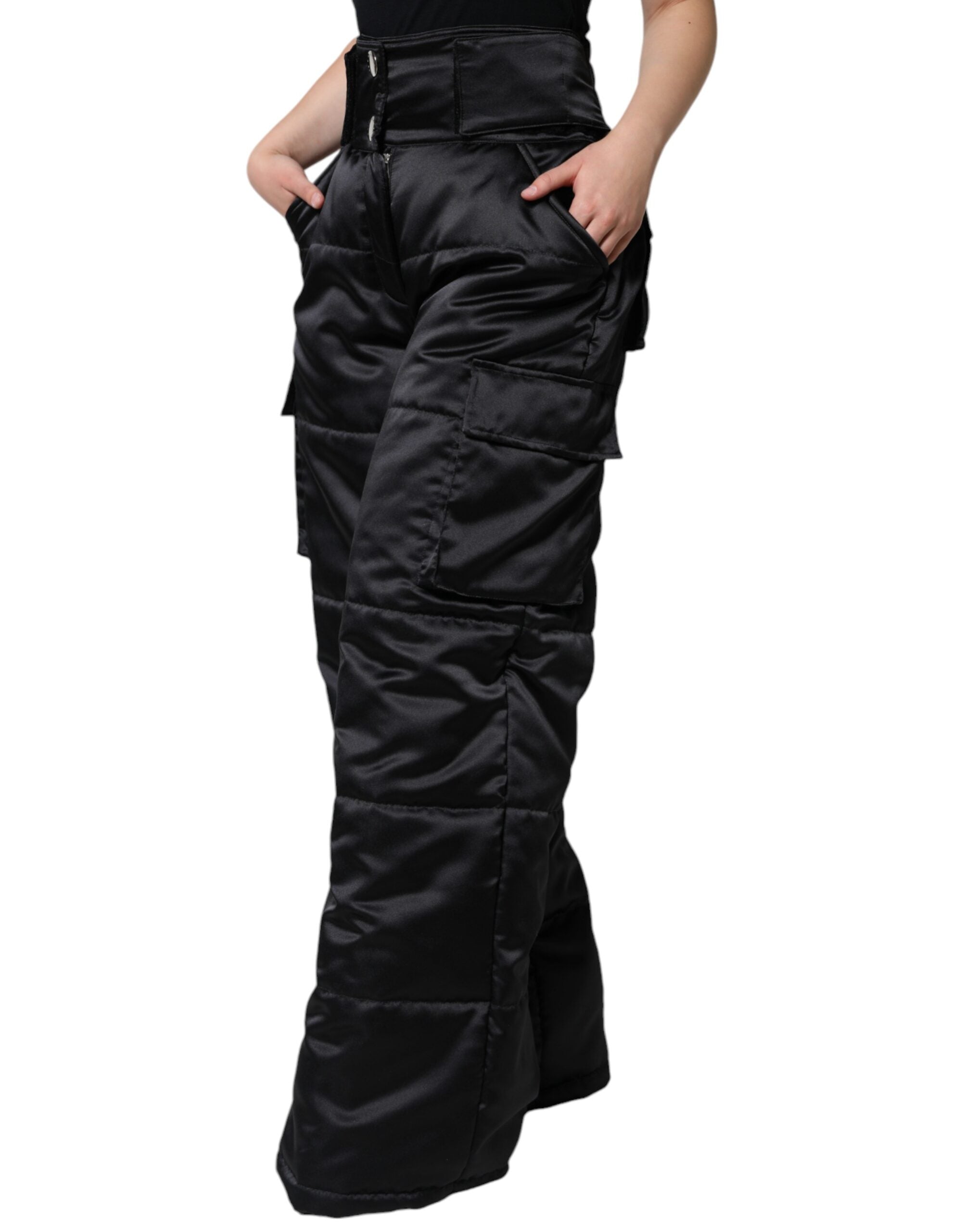 Black quilted high waist women's boot cut pants by Dolce & Gabbana, featuring a stylish quilted design and tailored fit.
