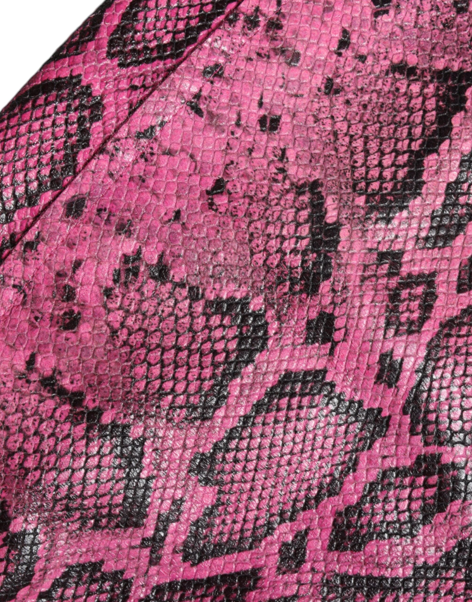 Pink leather high waist hot pants shorts by Dolce & Gabbana, showing a close-up of the stylish, fitted design and glossy finish.