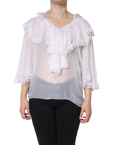 White ruffled lace long sleeve blouse top by Dolce & Gabbana, featuring intricate lace details and elegant ruffle accents.