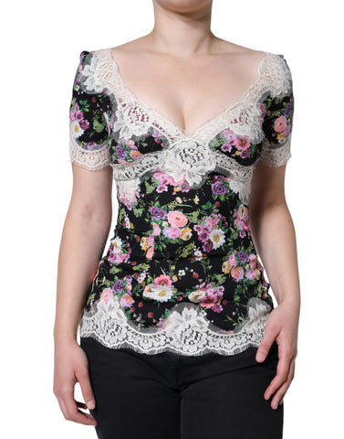 Black floral lace short sleeve blouse top by Dolce & Gabbana, featuring intricate lace details and a chic, feminine design.