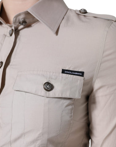 Beige cotton collared button-down shirt top by Dolce & Gabbana, showing front view with long sleeves and classic design.