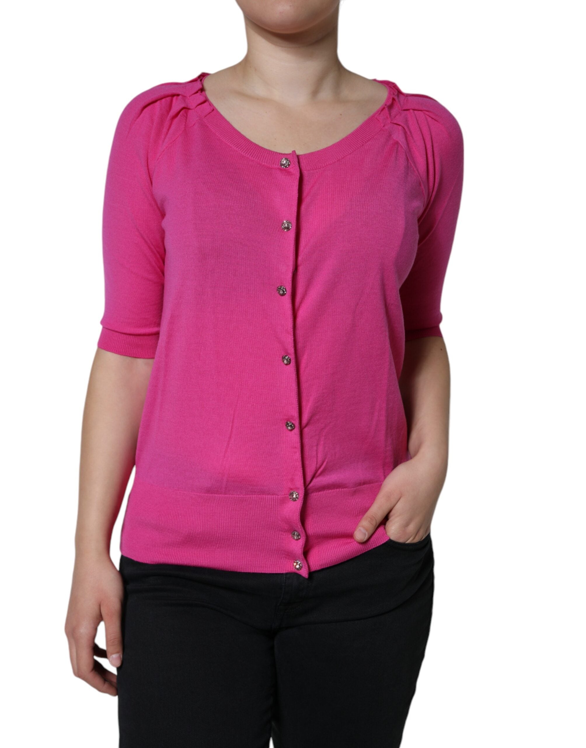Pink wool button-down short sleeve blouse by Dolce & Gabbana, featuring a classic collar and button front detail.