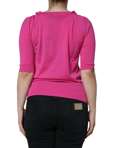 Pink wool button-down short sleeve blouse top by Dolce & Gabbana, featuring a classic collar and button detail.