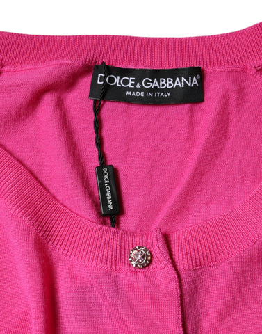 Pink wool button-down short sleeve blouse top by Dolce & Gabbana, featuring a classic collar and sleek button details.